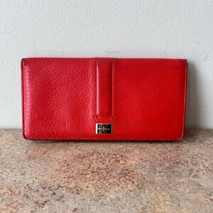 Cole Haan Red/Orange Leather Waller in good pre-owned condition